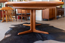 Load image into Gallery viewer, Restored Vintage Teak Pedestal Dining Table with Two Leaves