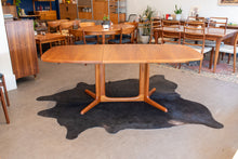 Load image into Gallery viewer, Restored Vintage Teak Pedestal Dining Table with Two Leaves