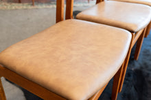 Load image into Gallery viewer, Vintage Teak Dining Chairs Reupholstered in Brown/Tan Vinyl - Set of Four