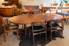 Load image into Gallery viewer, Vintage Round Gudme Rosewood Dining Table with two Leaves and Six Rosewood Chairs
