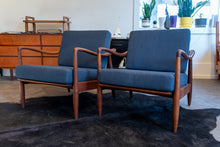 Load image into Gallery viewer, Pair of Vintage Walnut Lounge Chairs with Blue Upholstery in the style of Finn Juhl
