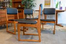 Load image into Gallery viewer, Restored Teak Dining Chairs in Black Vinyl - Set of Four

