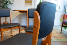 Load image into Gallery viewer, Restored Teak Dining Chairs in Black Vinyl - Set of Four
