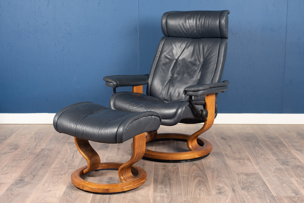 Pair of Ekornes Stresses Recliner and Ottoman